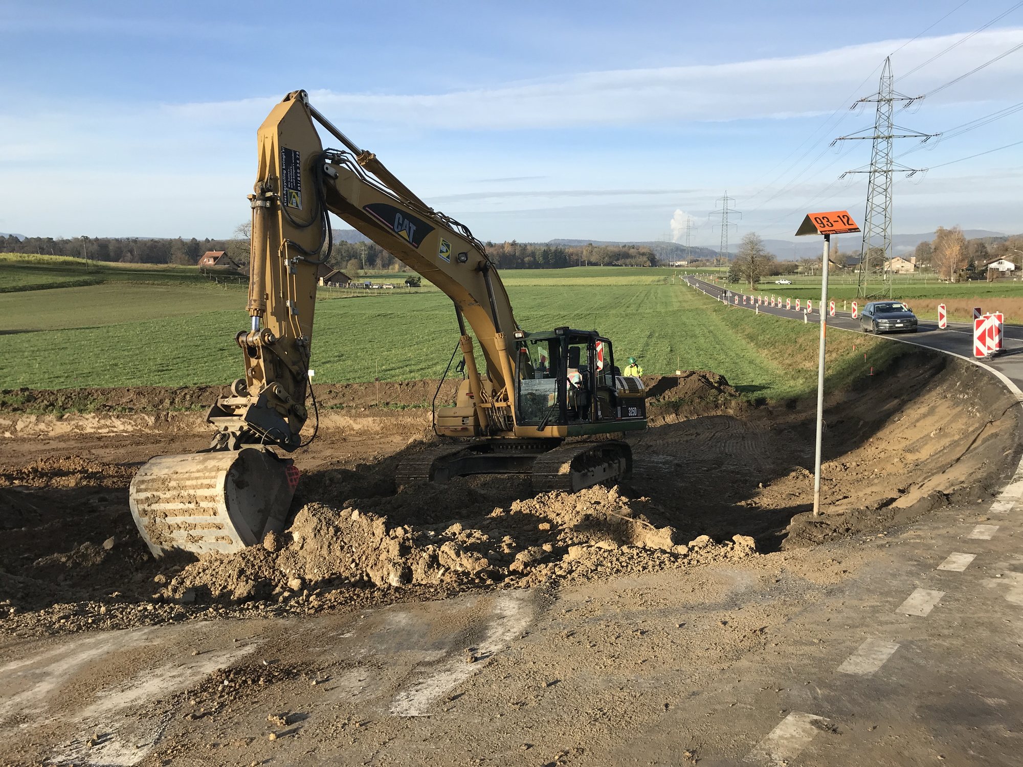 Walze und Fertiger beim Belagseinbau